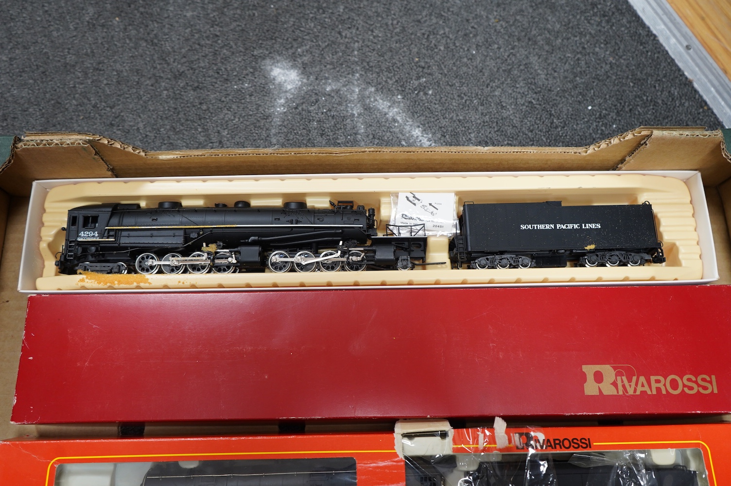 Three boxed Rivarossi HO gauge railway American outline tender locomotives; a Southern Pacific Lines 2-8-8-4, 4294, (1547), a Norfolk and Western 2-8-8-2, 2197, (1238), and a B&O 4-6-2, President Fillmore, (1540). Condit